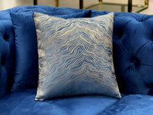 Load image into Gallery viewer, Royal blue cushion with gold wave pattern, adds bold elegance to modern sofas or beds