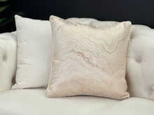 Load image into Gallery viewer, Champagne gold designer cushion with soft wave pattern, ideal for adding elegant style to sofas or beds