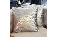 Load image into Gallery viewer, Silver cushion with bold zig-zag pattern on textured fabric, perfect for modern sofas and accent chairs