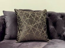 Load image into Gallery viewer, Black designer cushion with metallic gold stitched geometric pattern, perfect for sofas and lounge chairs
