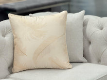 Load image into Gallery viewer, Cream cushion with soft feather pattern, perfect for a calm and elegant touch on sofas or beds

