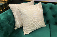 Load image into Gallery viewer, Earthy-toned designer cushion with rich textured fabric, perfect for adding warmth to beds and sofas
